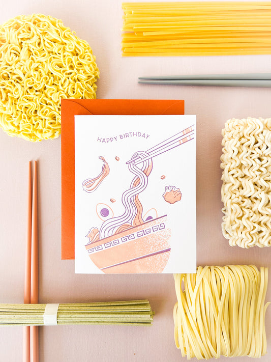 greeting card with a bowl of noodles to symbolize long life for birthday celebrations